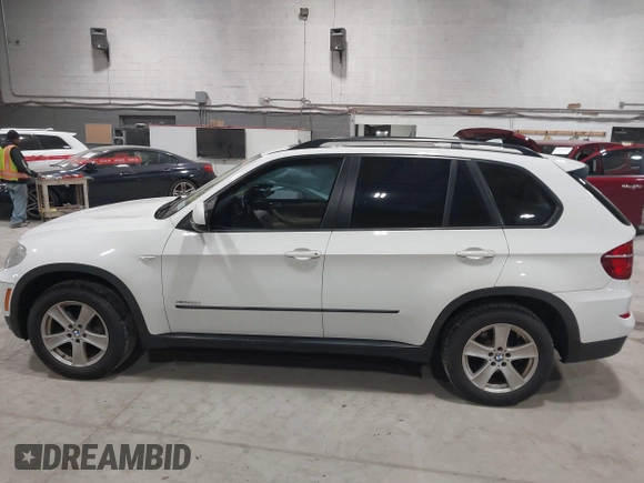 2012 BMW X5 35i z VIN 5UXZV4C54CL748257, wystawiony jako IAAI lot #42036669 z przebiegiem 122 438 mil mil oraz . Historia ofert i sprzedaży dostępna na DreamBid. Obrazek 14.