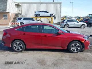 2020 Honda Civic LX с VIN 19XFC2F62LE001669, выставлен на аукционе IAAI как лот 41935062 с пробегом 68 285 миль миль и . История ставок и продаж доступна на DreamBid. Изображение 14.