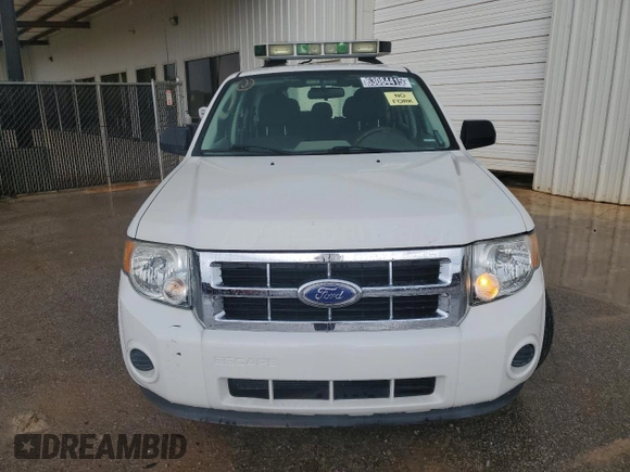 2011 Ford Escape XLS with VIN 1FMCU0C74BKC27897, listed as a Copart auction lot 63084415 with 116,423 mi miles and Clean title. Bid and sale history available at DreamBid. Image 5.