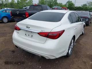 2018 Infiniti Q50 Luxe z VIN JN1EV7AR3JM445195, wystawiony jako IAAI lot #42228587 z przebiegiem 122 575 mil mil oraz . Historia ofert i sprzedaży dostępna na DreamBid. Obrazek 4.