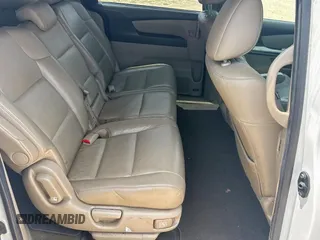 2011 Honda Odyssey Touring с VIN 5FNRL5H92BB008426, выставлен на аукционе Copart как лот 59419585 с пробегом 245 087 миль миль и Чистый • Clean title. История ставок и продаж доступна на DreamBid. Изображение 6.