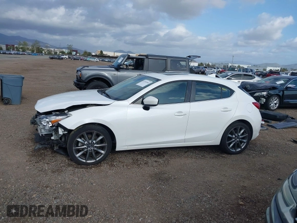 2018 Mazda 3 Touring with VIN 3MZBN1L31JM225108, listed as a IAAI auction lot 41959304 with 74,933 mi miles. Bid and sale history available at carsss.com. Image 15.