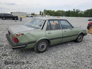 1981 Mazda 626 z VIN JM1GB2216B0531636, wystawiony jako Copart lot #54201075 z przebiegiem 41 823 mil mil oraz Szkoda całkowita • Salvage title. Historia ofert i sprzedaży dostępna na DreamBid. Obrazek 3.