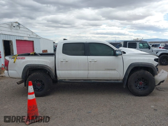 2017 Toyota Tacoma SR5 z VIN 3TMCZ5AN8HM077203, wystawiony jako IAAI lot #41765910 z przebiegiem 170 863 mil mil oraz . Historia ofert i sprzedaży dostępna na DreamBid. Obrazek 13.