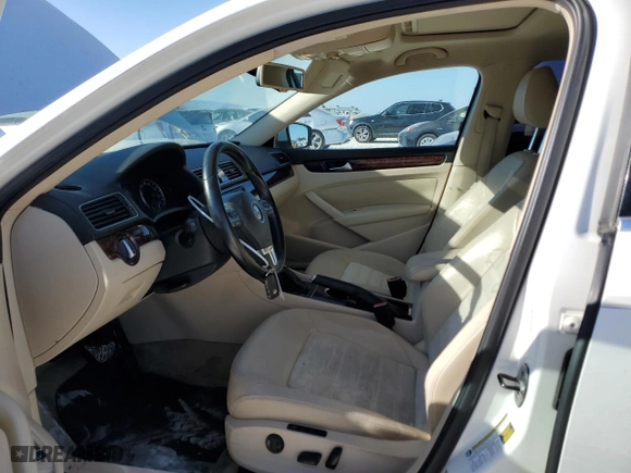 2013 Volkswagen Passat SEL Premium with VIN 1VWCM7A32DC063332, listed as a Copart auction lot 77217544 with 104,534 mi miles and Salvage Title. Bid and sale history available at carsss.com. Image 7.