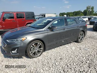 2020 Ford Fusion Titanium z VIN 3FA6P0D94LR262239, wystawiony jako Copart lot #63244815 z przebiegiem 48 448 mil mil oraz Szkoda całkowita • Salvage title. Historia ofert i sprzedaży dostępna na DreamBid. Obrazek 1.