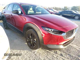 2023 Mazda CX-30 Premium Plus with VIN 3MVDMBEY5PM569612, listed as a Copart auction lot 85348014 with 17,217 mi miles and Salvage title. Bid and sale history available at DreamBid. Image 4.