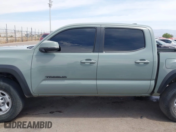 2022 Toyota Tacoma SR with VIN 3TMCZ5AN0NM507320, listed as a IAAI auction lot 42220296 with 33,342 mi miles and . Bid and sale history available at DreamBid. Image 14.