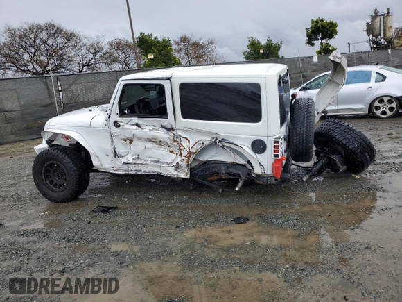 2013 Jeep Wrangler Sahara z VIN 1C4AJWBG7DL512437, wystawiony jako Copart lot #48928325 z przebiegiem Nie podano mil oraz Szkoda całkowita • Salvage title. Historia ofert i sprzedaży dostępna na DreamBid. Obrazek 2.