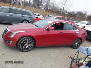 2013 Cadillac ATS Performance z VIN 1G6AJ5S37D0128394, wystawiony jako IAAI lot #41806117 z przebiegiem 225 901 mil mil oraz . Historia ofert i sprzedaży dostępna na DreamBid. Obrazek 14.