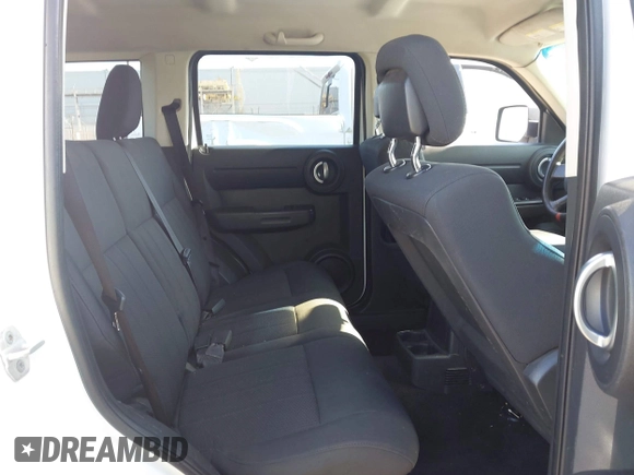 2011 Dodge Nitro Heat with VIN 1D4PT4GK9BW596989, listed as a IAAI auction lot 42397427 with 158,609 mi miles and . Bid and sale history available at DreamBid. Image 8.