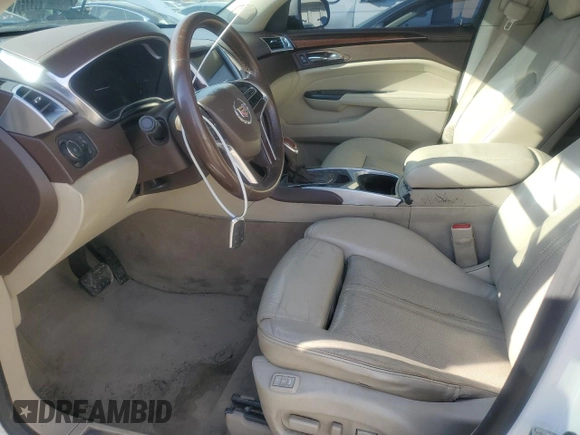 2015 Cadillac SRX Premium Collection with VIN 3GYFNDE39FS623425, listed as a Copart auction lot 47740135 with 133,838 mi miles and Salvage title. Bid and sale history available at DreamBid. Image 7.