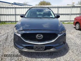 2021 Mazda CX-5 Touring with VIN JM3KFBCM0M0302015, listed as a Copart auction lot 55077305 with 40,558 mi miles and Salvage Title. Bid and sale history available at carsss.com. Image 5.