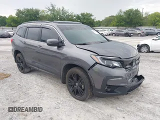 2021 Honda Pilot Special Edition z VIN 5FNYF5H20MB023029, wystawiony jako IAAI lot #42233615 z przebiegiem 81 851 mil mil oraz . Historia ofert i sprzedaży dostępna na DreamBid. Obrazek 1.