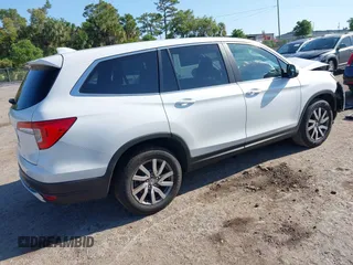2021 Honda Pilot EX-L with VIN 5FNYF5H53MB006638, listed as a IAAI auction lot 41994463 with 101,786 mi miles. Bid and sale history available at carsss.com. Image 4.