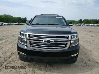 2015 Chevrolet Suburban LTZ with VIN 1GNSKKKC1FR624679, listed as a Copart auction lot 52957365 with 71,194 mi miles and Salvage Title. Bid and sale history available at DreamBid. Image 14.