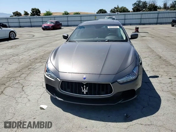 2016 Maserati Ghibli S with VIN ZAM57RSA3G1169053, listed as a Copart auction lot 58970355 with 73,843 mi miles and Salvage title. Bid and sale history available at DreamBid. Image 13.
