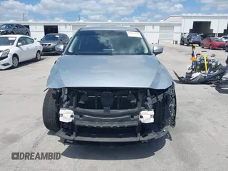 2017 Mazda CX-5 Sport with VIN JM3KFABLXH0135560, listed as a IAAI auction lot 42062016 with 153,416 mi miles. Bid and sale history available at carsss.com. Image 13.