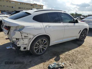 2021 BMW X4 xDrive30i with VIN 5UX2V1C0XM9E11002, listed as a Copart auction lot 67348653 with 27,805 mi miles. Bid and sale history available at carsss.com. Image 3.