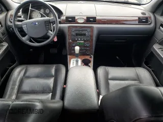 2006 Ford Five Hundred Limited z VIN 1FAFP28146G165585, wystawiony jako Copart lot #57722995 z przebiegiem 201 490 mil mil oraz Nie do naprawy. Historia ofert i sprzedaży dostępna na DreamBid. Obrazek 8.