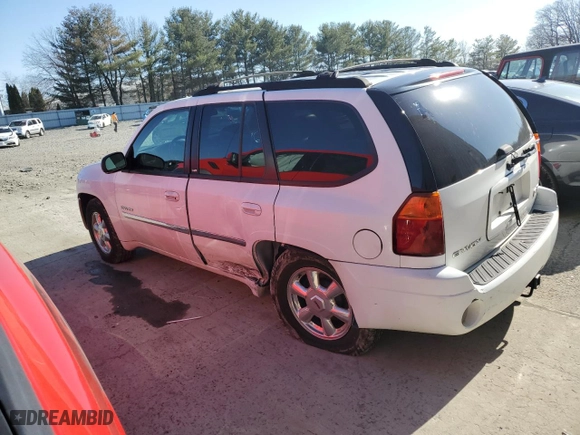 2006 GMC Envoy SLE with VIN 1GKDT13S762221043, listed as a Copart auction lot 48137095 with 0 mi miles and Salvage Title. Bid and sale history available at carsss.com. Image 2.