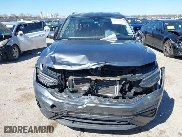 2023 Volkswagen Tiguan SE with VIN 3VV3B7AX5PM142378, listed as a IAAI auction lot 41835204 with 13,670 mi miles and . Bid and sale history available at DreamBid. Image 12.