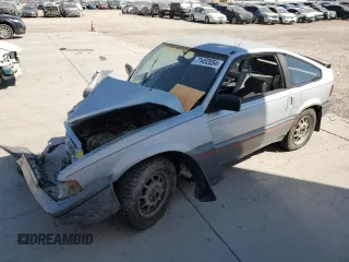 1987 Honda Civic z VIN JHMEC1327HS029350, wystawiony jako Copart lot #71452054 z przebiegiem 356 810 mil mil oraz Szkody całkowita. Historia ofert i sprzedaży dostępna na DreamBid. Obrazek 1.