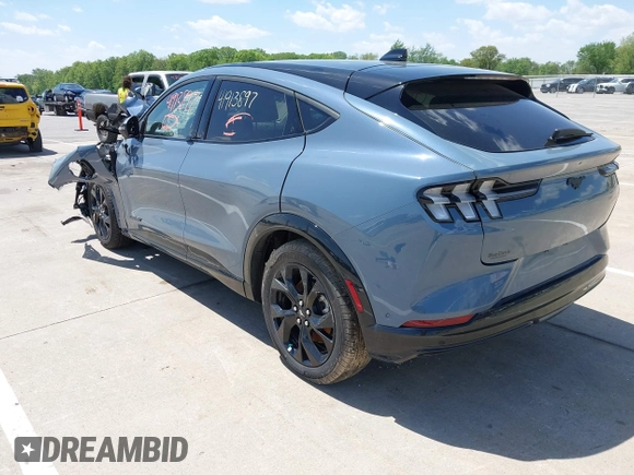 2023 Ford Mustang Mach-E Premium z VIN 3FMTK3SU1PMA84387, wystawiony jako IAAI lot #41913897 z przebiegiem 4180 mil mil oraz . Historia ofert i sprzedaży dostępna na DreamBid. Obrazek 3.
