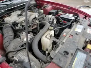 2004 Ford Mustang Deluxe with VIN 1FAFP444X4F112744, listed as a Copart auction lot 86508014 with 131,560 mi miles and Salvage title. Bid and sale history available at DreamBid. Image 13.