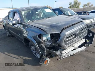 2018 Toyota Tacoma SR5 with VIN 3TMBZ5DN8JM013191, listed as a IAAI auction lot 42555761 with 34,542 mi miles and . Bid and sale history available at DreamBid. Image 1.