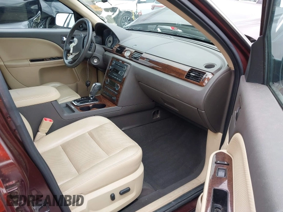 2009 Ford Taurus Limited z VIN 1FAHP25W59G115291, wystawiony jako IAAI lot #42195549 z przebiegiem 58 983 mil mil oraz . Historia ofert i sprzedaży dostępna na DreamBid. Obrazek 5.
