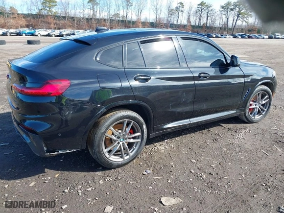 2021 BMW X4 M40i with VIN 5UX2V5C03M9H54824, listed as a IAAI auction lot 41817714 with 34,880 mi miles. Bid and sale history available at carsss.com. Image 4.