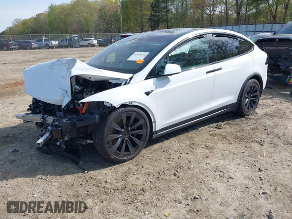 2022 Tesla Model X Plaid z VIN 7SAXCBE6XNF340704, wystawiony jako IAAI lot #41928524 z przebiegiem Nie podano mil oraz . Historia ofert i sprzedaży dostępna na DreamBid. Obrazek 2.