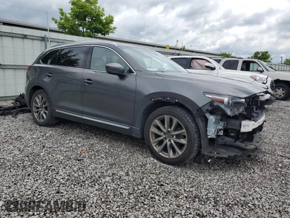 2018 Mazda CX-9 Grand Touring with VIN JM3TCADY7J0211781, listed as a Copart auction lot 59477885 with 77,667 mi miles and Salvage title. Bid and sale history available at DreamBid. Image 4.