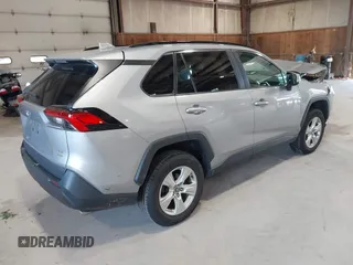 2021 Toyota RAV4 XLE with VIN 2T3P1RFV5MC180890, listed as a IAAI auction lot 42567858 with 56,961 mi miles and . Bid and sale history available at DreamBid. Image 4.