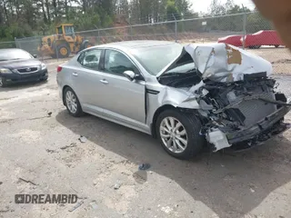 2015 Kia Optima EX with VIN 5XXGN4A77FG501283, listed as a IAAI auction lot 41836864 with 19,875 mi miles. Bid and sale history available at carsss.com. Image 1.