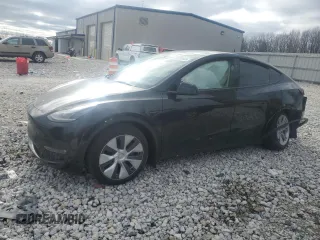 2023 Tesla Model Y Long Range z VIN 7SAYGDEE2PF869952, wystawiony jako Copart lot #53253585 z przebiegiem Nie podano mil oraz Szkody całkowita. Historia ofert i sprzedaży dostępna na DreamBid. Obrazek 1.