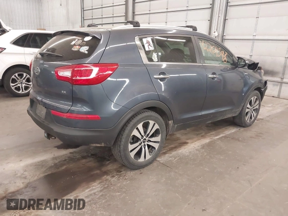 2011 Kia Sportage EX with VIN KNDPCCA27B7037886, listed as a IAAI auction lot 42264598 with 211,538 mi miles and . Bid and sale history available at DreamBid. Image 4.