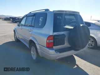 2002 Suzuki XL-7 LX with VIN JS3TY92V824104977, listed as a IAAI auction lot 41494699 with 161,262 mi miles. Bid and sale history available at carsss.com. Image 3.