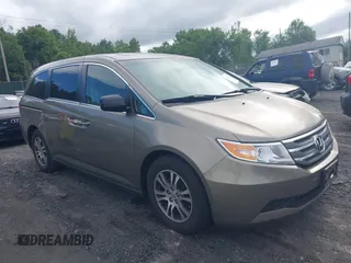 2012 Honda Odyssey EX-L z VIN 5FNRL5H64CB091073, wystawiony jako IAAI lot #42760245 z przebiegiem 193 617 mil mil oraz . Historia ofert i sprzedaży dostępna na DreamBid. Obrazek 1.