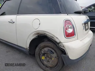 2011 MINI Hardtop with VIN WMWSU3C56BT093403, listed as a IAAI auction lot 42795188 with 123,454 mi miles and . Bid and sale history available at DreamBid. Image 6.