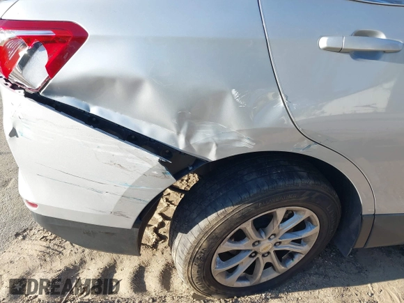 2020 Chevrolet Equinox LT with VIN 2GNAXUEV7L6111580, listed as a IAAI auction lot 41830060 with 96,968 mi miles and . Bid and sale history available at DreamBid. Image 6.