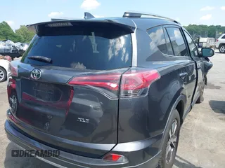 2018 Toyota RAV4 XLE with VIN JTMWFREV9JJ201845, listed as a IAAI auction lot 42442303 with 111,177 mi miles and . Bid and sale history available at DreamBid. Image 4.