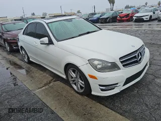 2014 Mercedes-Benz C 250 Sport with VIN WDDGF4HB4EA933398, listed as a Copart auction lot 49122985 with 141,039 mi miles and Clean title. Bid and sale history available at DreamBid. Image 4.