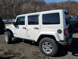 2017 Jeep Wrangler Unlimited Rubicon with VIN 1C4HJWFG9HL543266, listed as a Copart auction lot 50002055 with 50,223 mi miles and Salvage title. Bid and sale history available at DreamBid. Image 2.