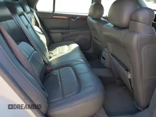2005 Cadillac DeVille z VIN 1G6KD54Y65U100231, wystawiony jako Copart lot #55758605 z przebiegiem 166 871 mil mil oraz Szkoda całkowita • Salvage title. Historia ofert i sprzedaży dostępna na DreamBid. Obrazek 10.