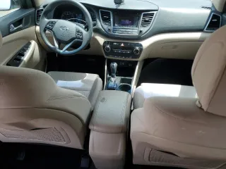 2016 Hyundai Tucson SE z VIN KM8J23A4XGU243394, wystawiony jako Copart lot #56556265 z przebiegiem 91 305 mil mil oraz Szkoda całkowita • Salvage title. Historia ofert i sprzedaży dostępna na DreamBid. Obrazek 8.
