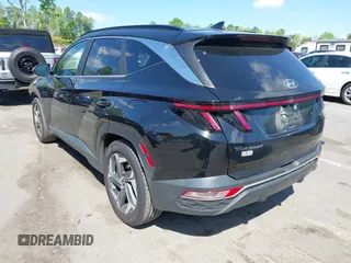2022 Hyundai Tucson SEL z VIN 5NMJF3AE6NH018945, wystawiony jako IAAI lot #42050780 z przebiegiem 113 680 mil mil oraz . Historia ofert i sprzedaży dostępna na DreamBid. Obrazek 3.