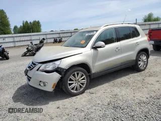 2011 Volkswagen Tiguan SEL z VIN WVGBV7AX6BW559854, wystawiony jako Copart lot #56268195 z przebiegiem 107 428 mil mil oraz Czysty tytuł • Clean title. Historia ofert i sprzedaży dostępna na DreamBid. Obrazek 1.