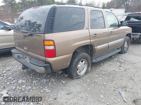 2003 GMC Yukon SLT with VIN 1GKEC13T73R126739, listed as a IAAI auction lot 41361906 with 166,748 mi miles. Bid and sale history available at carsss.com. Image 4.